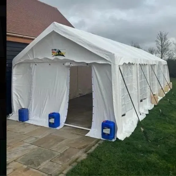 Marquee Exterior Setup For Private Event Hire White marquee exterior setup with open entrance ready for private event