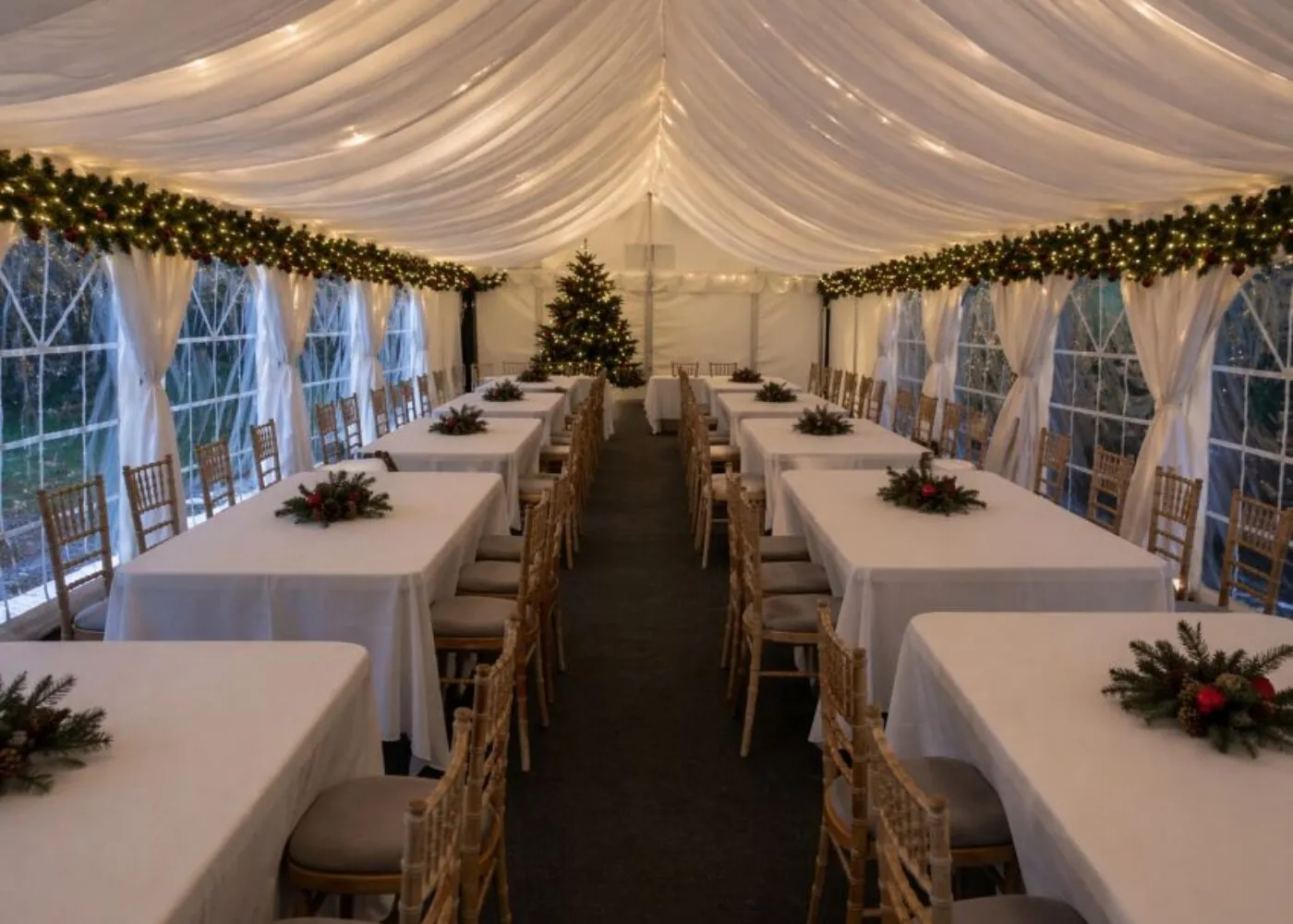 Christmas Marquee Banquet Layout with Table Spacing in Essex Christmas marquee banquet layout with spaced tables and chairs for festive dining in Essex