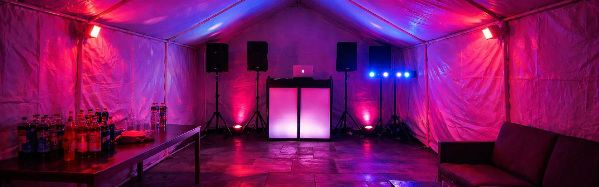 DJ Hire Marquee Party Setup with Lighting DJ hire in Essex inside a marquee with lighting and sound system for party events