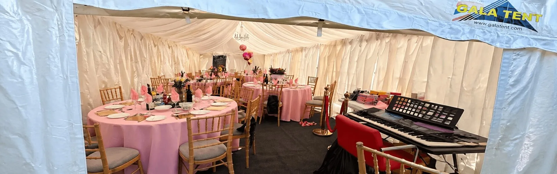 Hainault Birthday Marquee Hire Interior Setup Garden marquee hire in Hainault for 89th and 90th birthday events with draped interior, round tables and Chiavari chairs