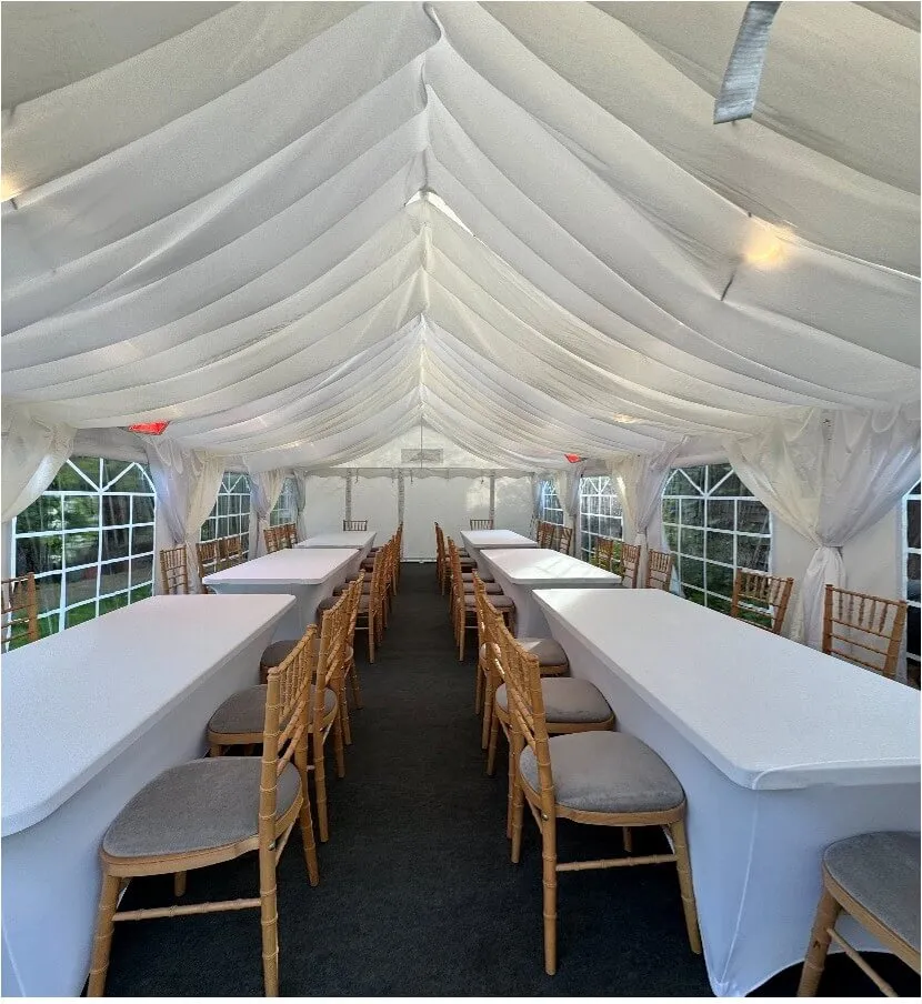 Marquee Interior Long Table Setup – Tilbury Garden Event 4m x 8m marquee interior with long table layout and Chiavari chairs for garden party in Tilbury