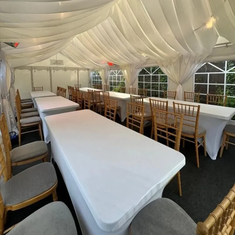 Event furniture hire in Essex with tables and chairs arranged for flexible marquee layout