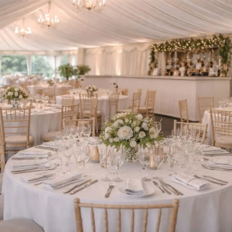 Marquee Interior Event Setup Example Essex Example of marquee interior setup with tables chairs and bar area