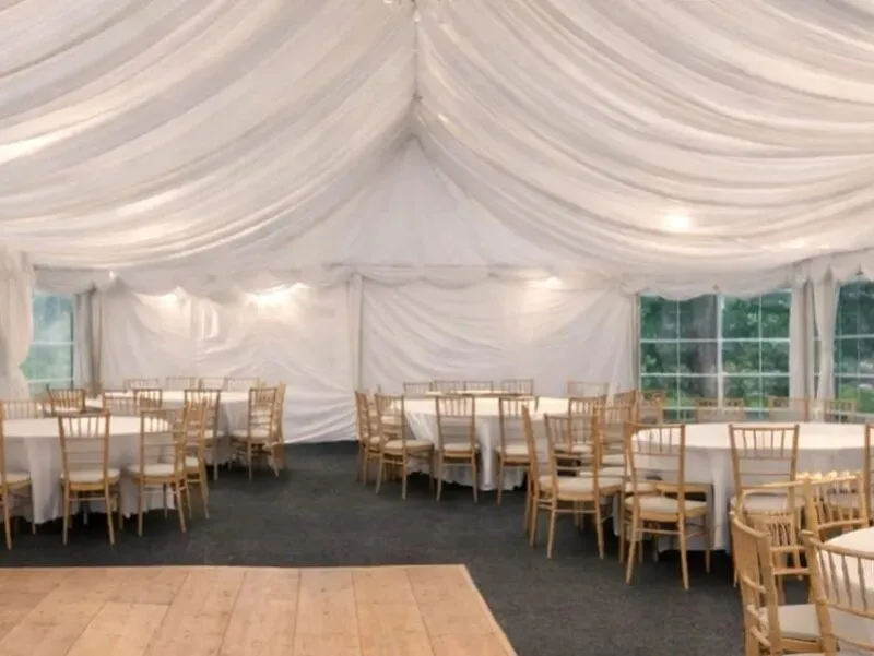 Marquee Pricing and Interior Setup Example Marquee hire interior in Essex showing dining layout and setup used for pricing and hire costs