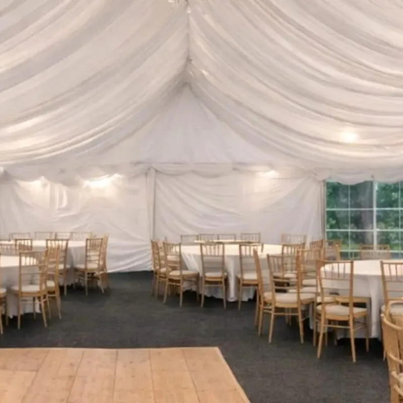 Marquee Pricing and Interior Setup Example Marquee hire interior in Essex showing dining layout and setup used for pricing and hire costs
