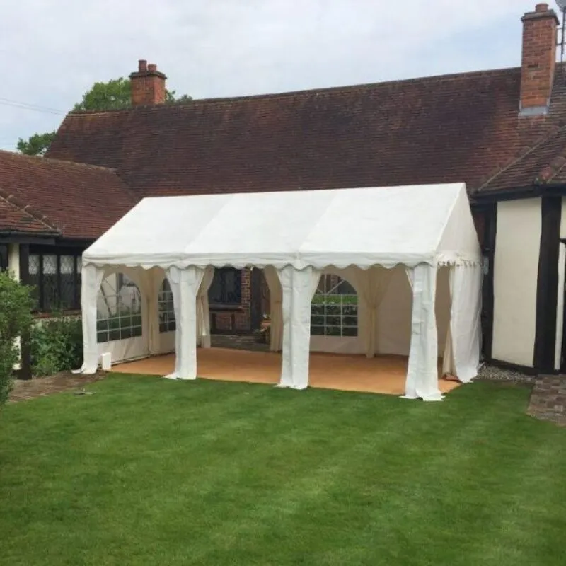 Marquee Hire Essex – Structure and Flooring Setup Marquee hire setup in Essex showing structure and flooring installation for private event