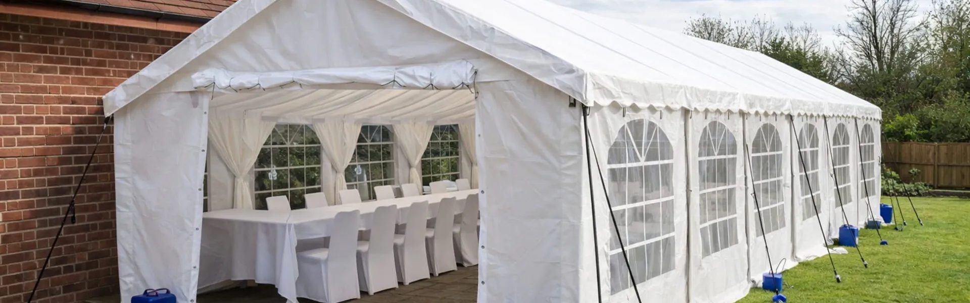 Marquee Hire Garden Setup Marquee setup in residential garden next to house showing event planning and hire service