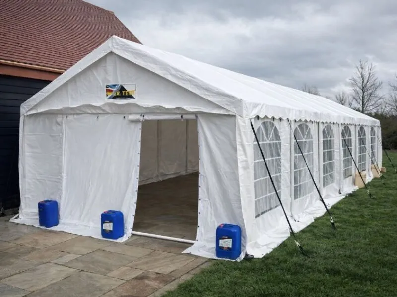 Marquee Hire for Gardens and Venues Marquee hire setup in Essex showing exterior structure in a garden and venue setting