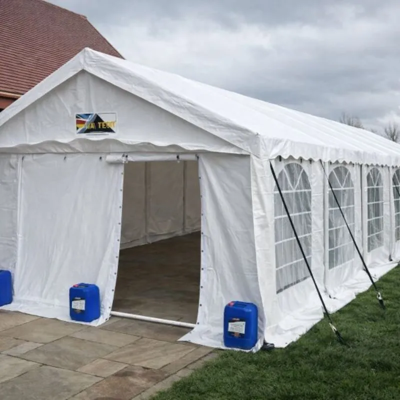 Marquee Hire for Gardens and Venues Marquee hire setup in Essex showing exterior structure in a garden and venue setting