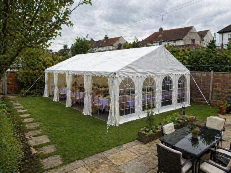 marquee-hire-hainault-garden Marquee hire setup in Hainault garden viewed from elevated angle for private events