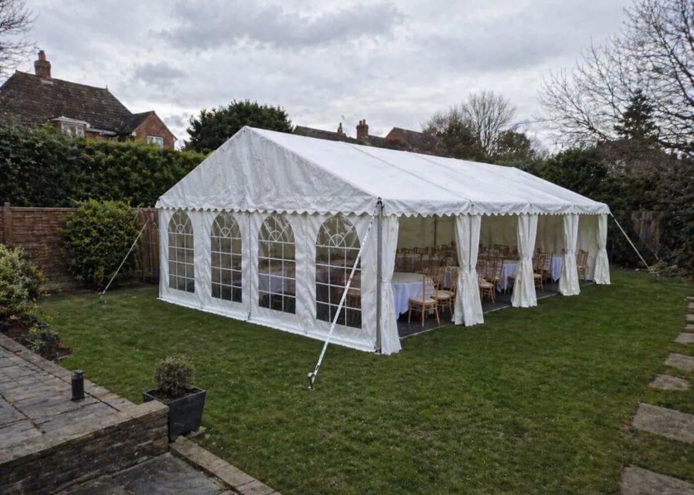 Marquee Hire Setup in London Residential Garden Marquee hire setup in residential garden in London for private events