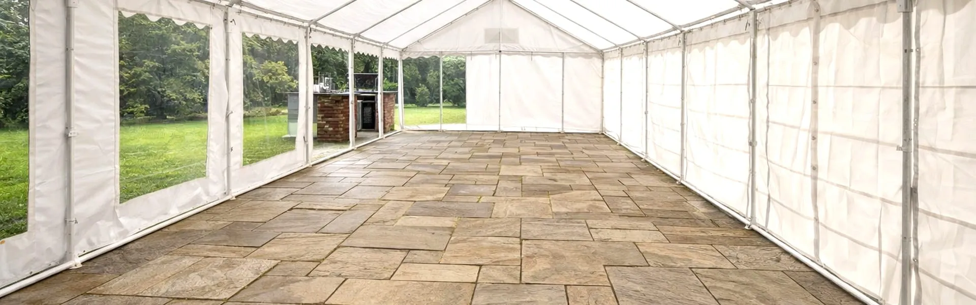 Marquee Hire Setup With Flooring And Structure Empty marquee with flooring and structure setup for marquee hire pricing