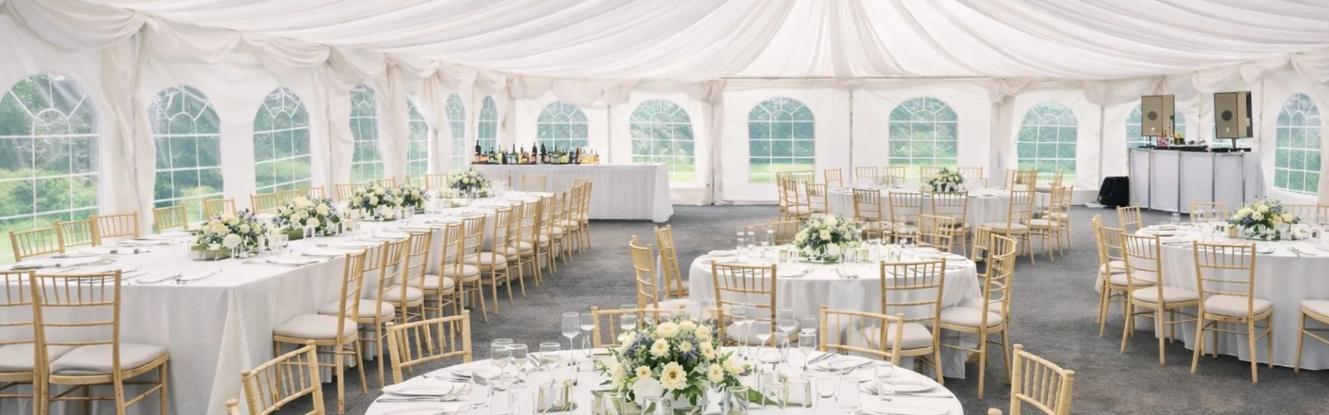 Marquee Interior Layout And Event Hire Setup Marquee interior with round tables and seating layout representing event hire setup and pricing options