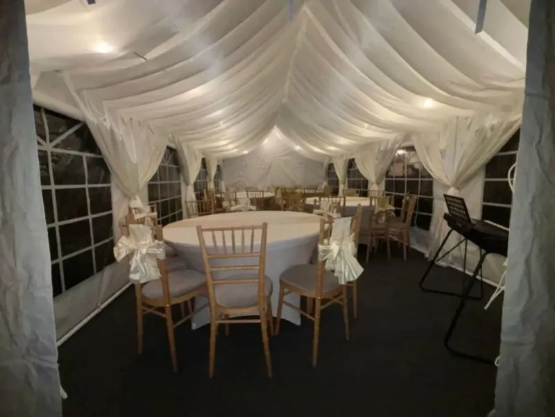 Marquee hire dining setup in Essex showing layout and seating used for event pricing and hire costs