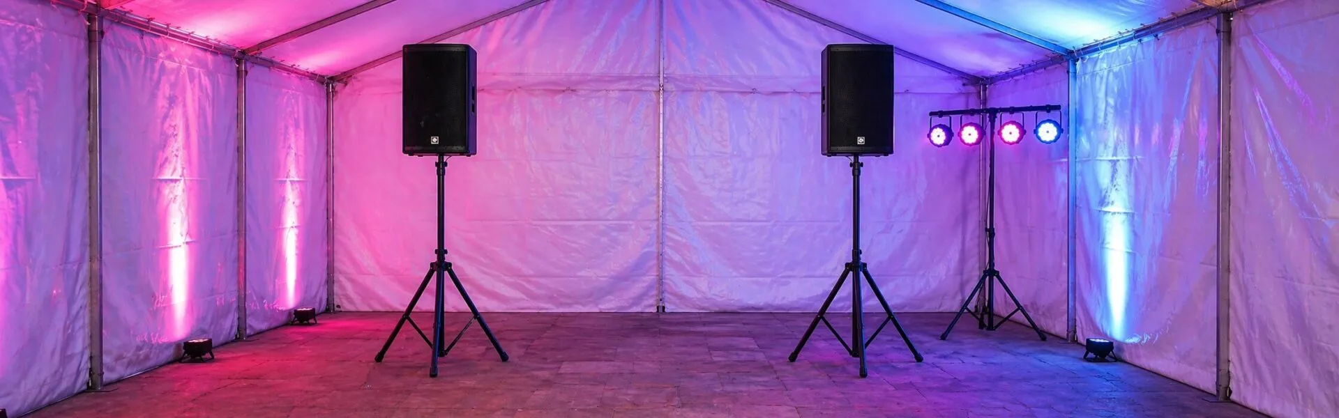 Speaker Hire Sound System with Event Lighting in Marquee Speaker hire sound system with lighting setup inside marquee