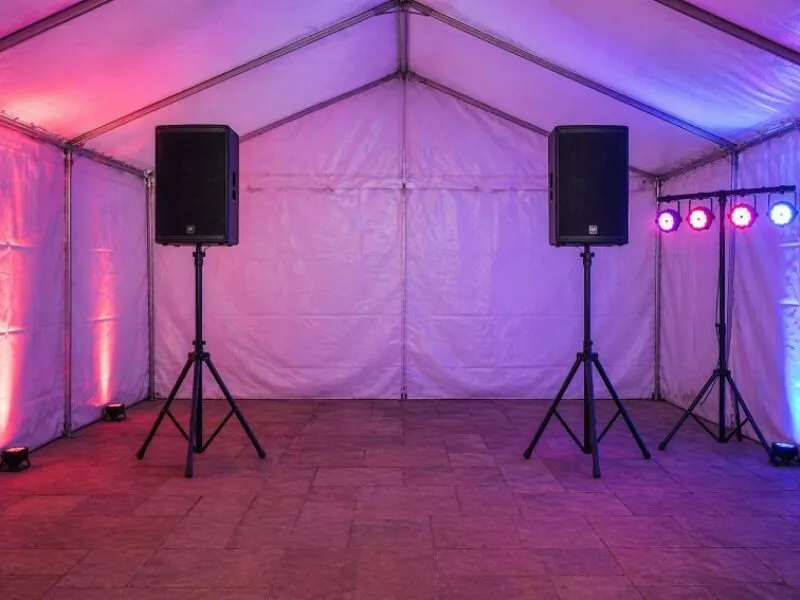 Speaker Hire Setup with Sound System and Lighting in Marquee Speaker hire setup with two speakers and event lighting inside marquee