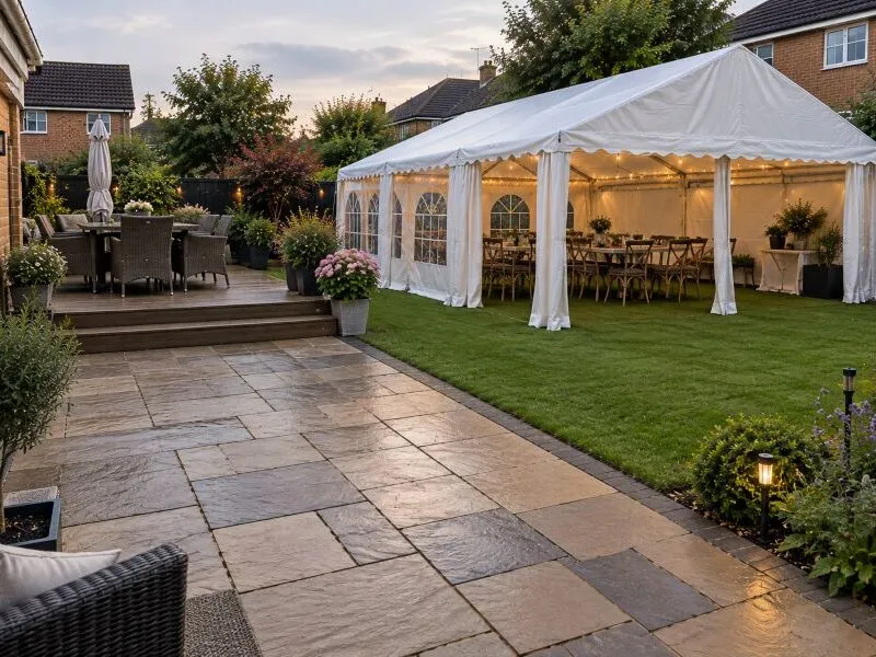 Marquee on Patio, Decking and Artificial Grass in a UK Garden Marquee in a UK garden with patio, raised decking and artificial grass